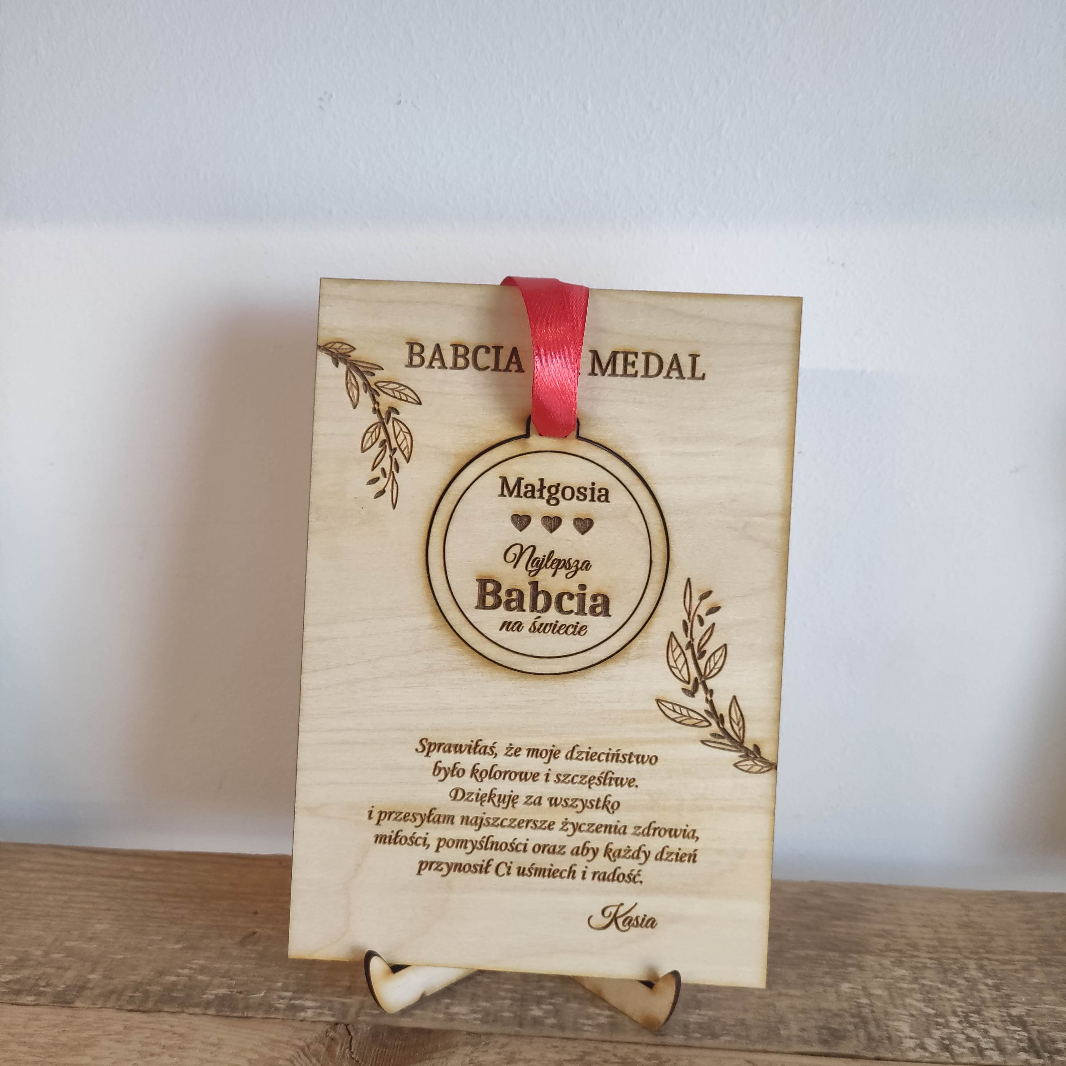 Medal w ramce że zdjęciem